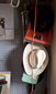 Chris Thornock’s Studio, cowboy hats, cord and dust pan, photo by Gerry Johnson