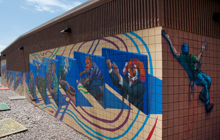 Urban Masquerade, a mural on the side of the Utah Division of Arts and Museums office building at 350 South 500 West, photo by Gerry Johnson